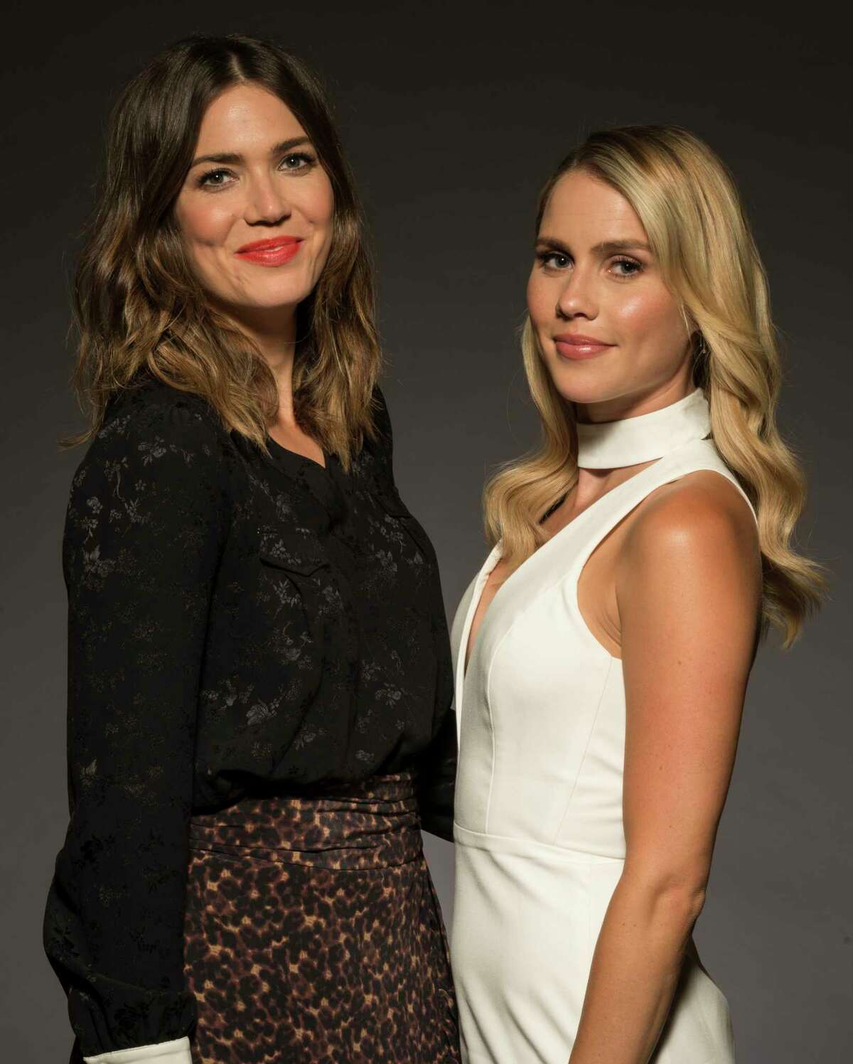 In this June 2, 2017 photo, Mandy Moore, left, and Claire Holt pose for a portrait at the "47 Meters Down" junket at the Montage Hotel in Beverly Hills, Calif. (Photo by Ron Eshel/Invision/AP)