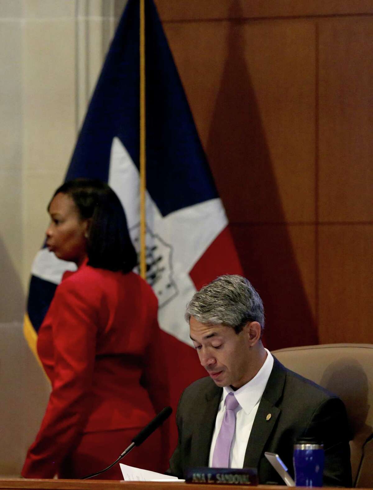 Mayor elect Ron Nirenberg, prepares for the last city council A session under Mayor Ivy Taylor, background, on Thursday, June 15, 2017. Reportedly, Taylor has not talked to Nirenberg since his mayoral victory at the poles last Saturday.