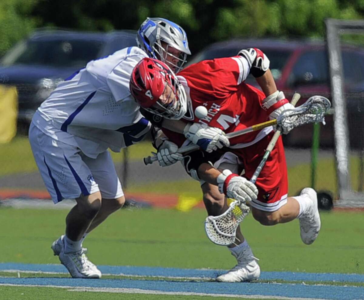 Darien’s Tanner Strub and Greenwich’s Bailey Savio faceoff in a CIAC boys lacrosse quarterfinal game at Darien High School in Darien on June 3. Savio won 77 percent of faceoffs and was rewarded by being named to the U.S. Lacrosse Connecticut All-America Lacrosse Team. A faceoff specialist/midfielder, Savio also earned First Team All-State (Class L) honors and was an All-FCIAC First-Team selection.