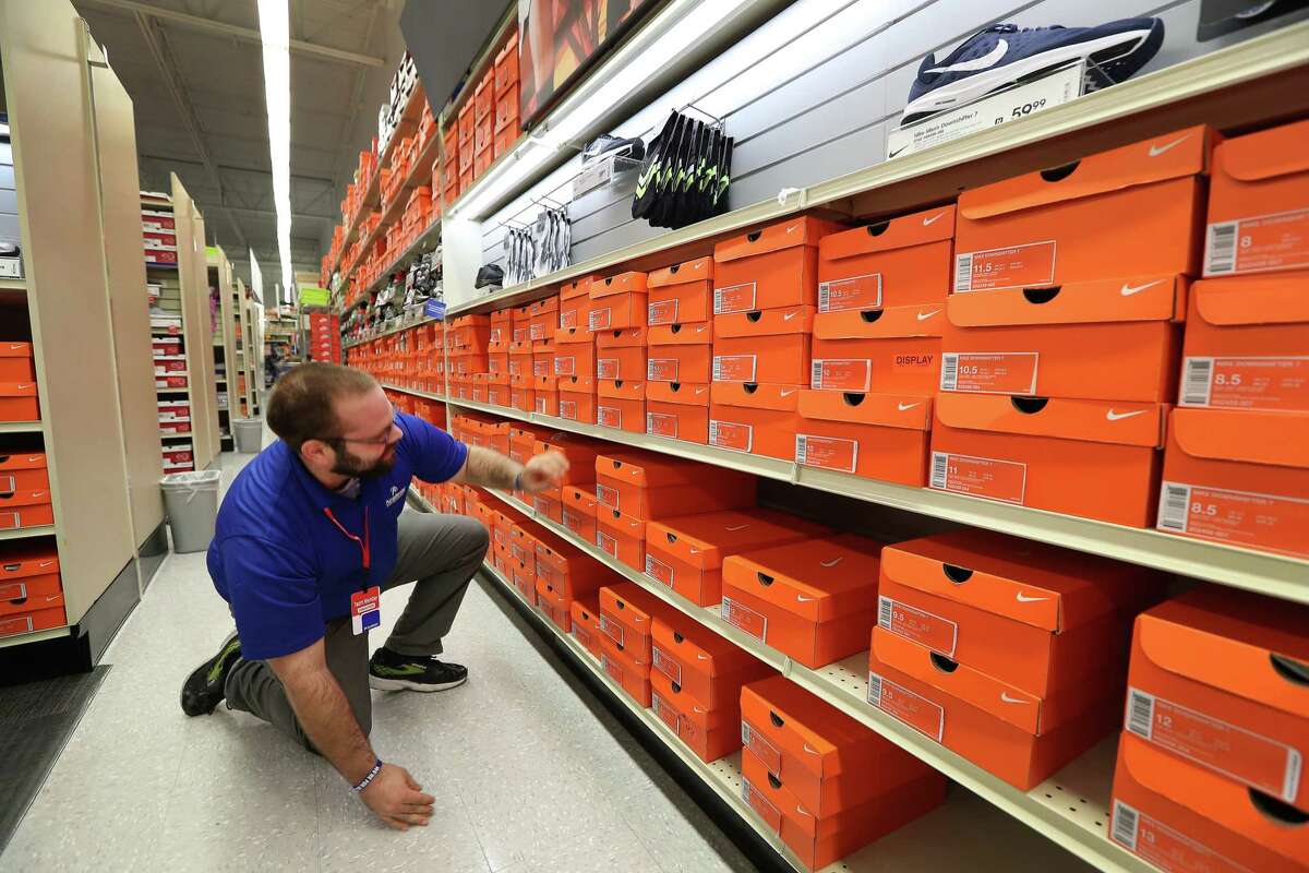 Academy Sports & Outdoors, 9734 Katy Freeway at Bunker Hill, Team Leader Christopher Wade arranges shoe boxes Thursday, June 1, 2017, in Houston. Academy Sports & Outdoors, a sports, outdoor and lifestyle retailer with more than 230 stores in 16 states, is one of Houston's largest private companies. ( Steve Gonzales / Houston Chronicle )
