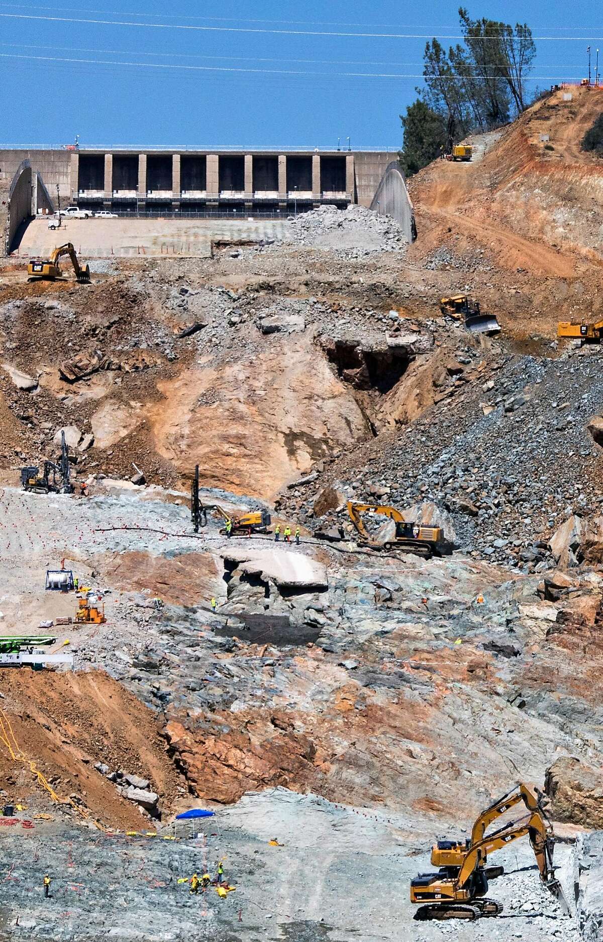 Reconstruction continues on the main spillway at the Oroville Dam in Oroville, Calif. Tuesday, June 13, 2017.