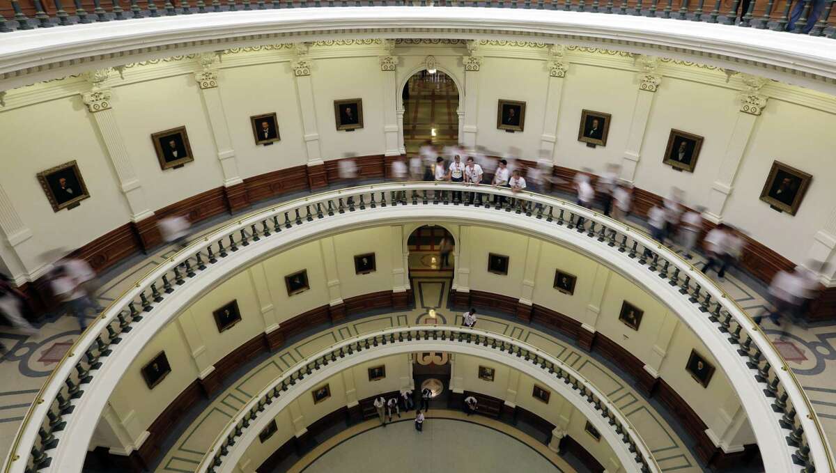 Visitors move though the rotunda at the Texas Capitol, Thursday, June 15, 2017, in Austin, Texas. With a special session set to begin July 18th, Texas Gov. Greg Abbott is reviving a so-called "bathroom bill" targeting transgender people after the last try ended with Republican lawmakers angry and deadlocked. (AP Photo/Eric Gay)