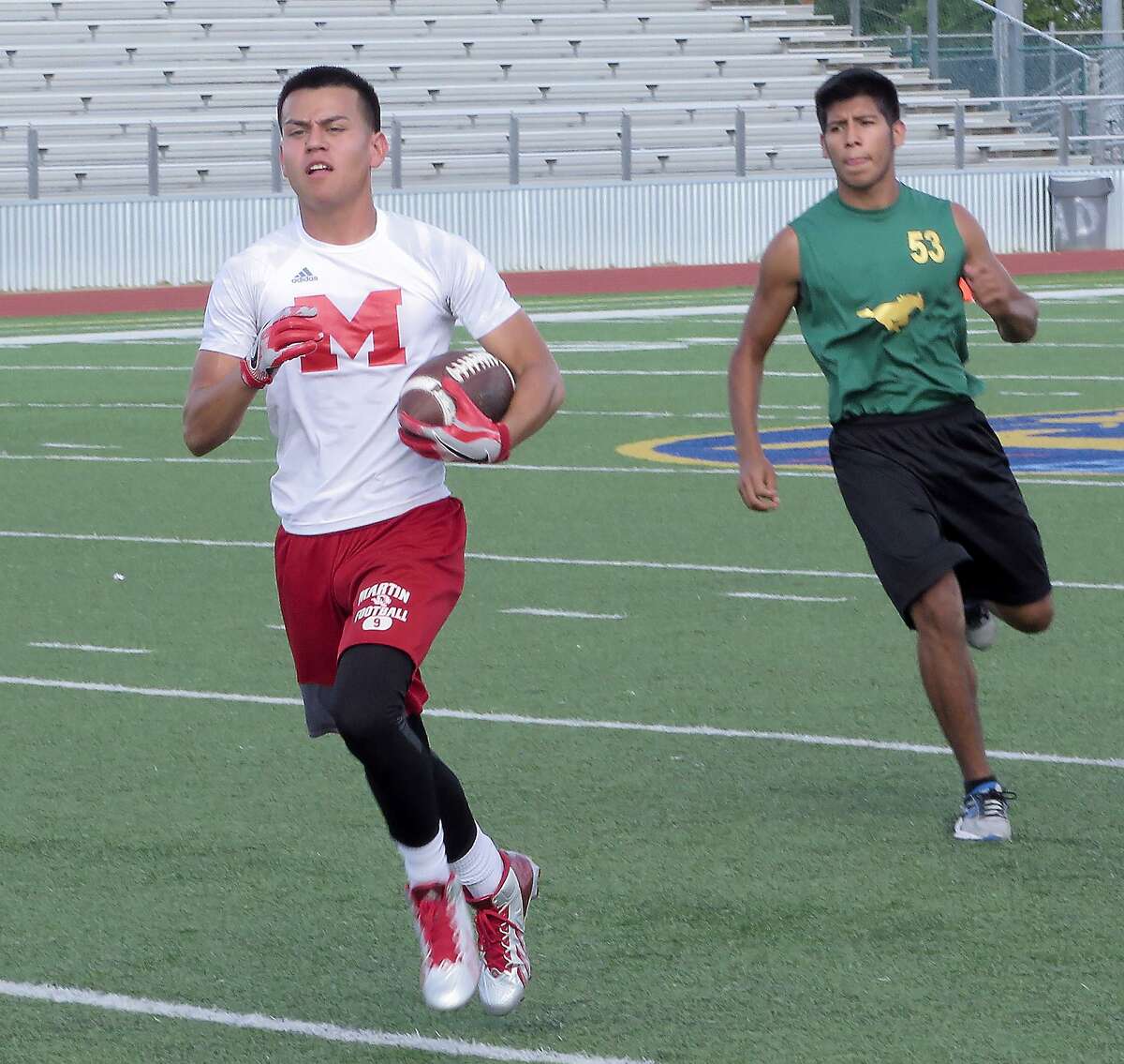 Martin’s Angel Davila and the Tigers tied with Nixon 39-39 during Week 2 of summer league 7-on-7 football at Krueger Field.