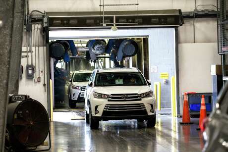 Vehicles are washed at Gulf States Toyota Vehicle Processing Center on Thursday, June 1, 2017, in Houston. ( Brett Coomer / Houston Chronicle )