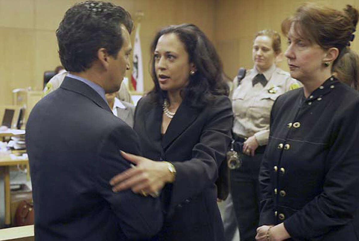 Refusal to seek the death penalty in officer's murder Harris' profile in the Democratic Party may be rising, but she has also had her share of scrapes with the party. In 2004, San Francisco Police Department Officer Isaac Espinoza was shot and killed while on duty. Three days after his murder, Harris announced that she would not seek the death penalty, drawing ire from the San Francisco Police Officers Association. U.S. Senator and former SF Mayor Dianne Feinstein later called on Harris to seek the death penalty, but she still refused. In this file photo April 14, 2004, Harris stops to speak with an unidentified family member of Espinoza at the arraignment of suspect David Hill in San Francisco. Hill was convicted of murder and sentenced to life in prison.