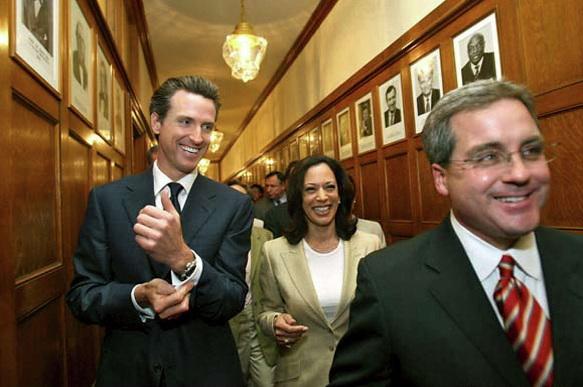 Newsom, Harris and Herrera celebrate LGBT rights milestone In this file photo from May 15, 2008, then-SF Mayor Gavin Newsom, Kamala Harris and City Attorney Dennis Herrera walk out of the mayor's office in route to a press conference in the City Hall rotunda after hearing the California Supreme Court ruling striking down a previous ban on same-sex marriage, which gave same-sex couples a constitutional right to marry in California. As SF district attorney, Harris focused on hate crimes to LGBT children in schools. In July 2006, she also convened a conference to address "gay panic," which has been used to justify hate crimes against members of the LGBT community.