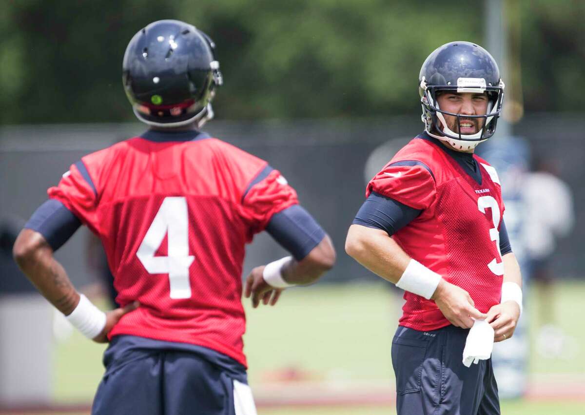 For now, Tom Savage, right, is the Texans' starting QB, but plenty of eyes will be on first-round pick Deshaun Watson, left, in camp.