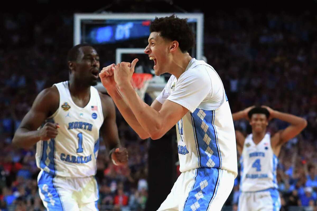 Small forward Justin Jackson, center, returned for his junior year and helped North Carolina capture a national championship in April.