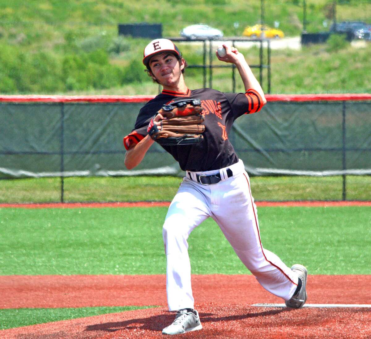 Edwardsville’s Lucas Clayton delivers a pitch during the second inning.