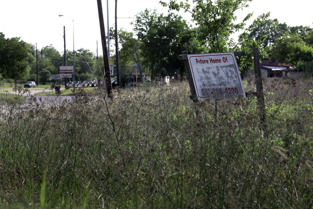A blank sign is seen in an empty lot, at the intersection of Scott Street and Airport Boulevard, in the Sunnyside neighborhood, Thursday, June 1, 2017, in Houston.