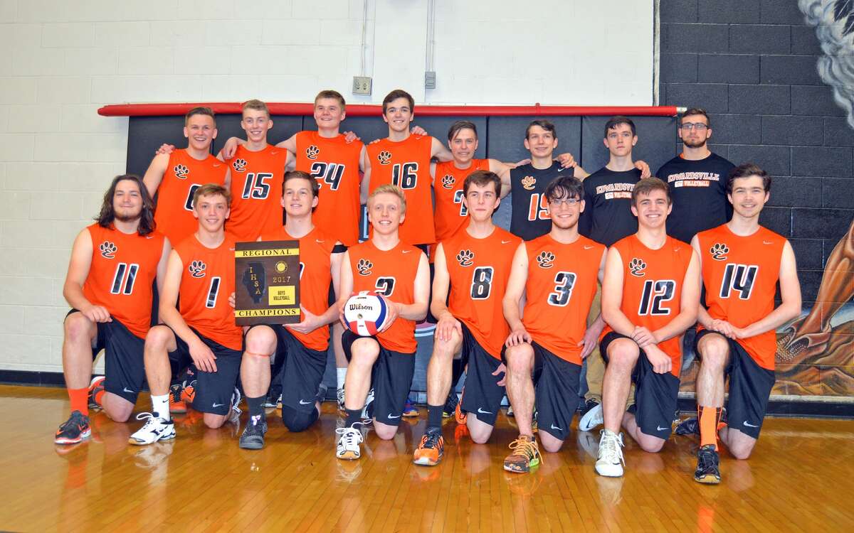 The EHS boys’ volleyball team poses with the Granite City Regional championship plaque after defeating Belleville West in the finals.