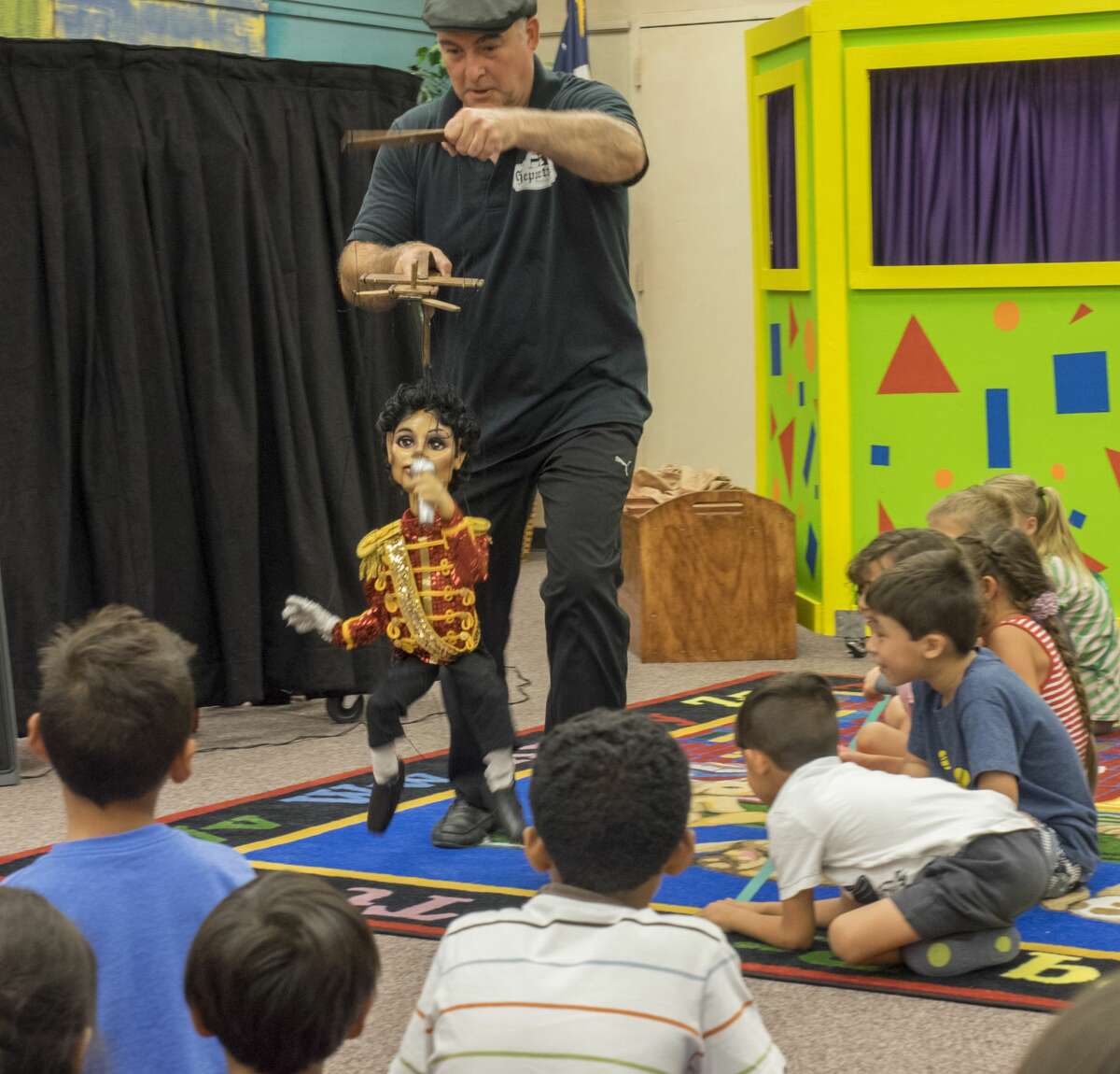 Kent Williams, with Geppetto's Marionette Theater out of Dallas, performs 6/15/17 at the Midland County Library downtown branch. Tim Fischer/Reporter-Telegram