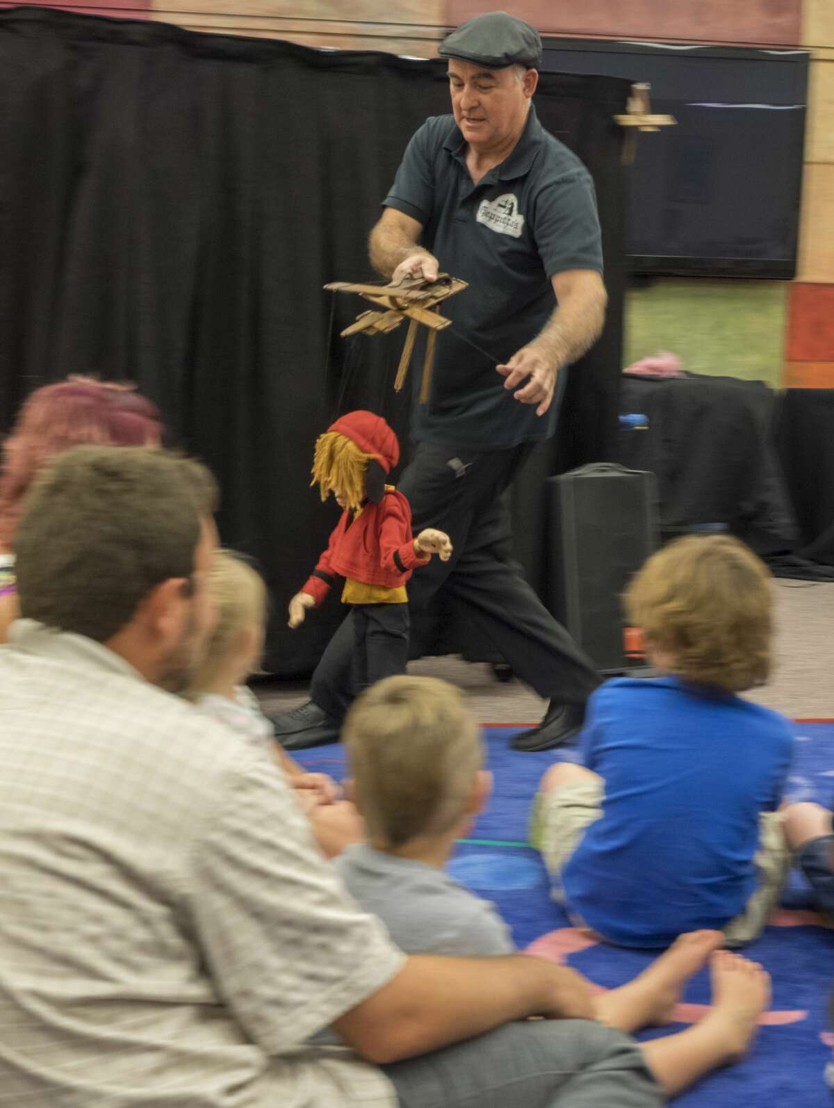 Kent Williams, with Geppetto's Marionette Theater out of Dallas, performs 6/15/17 at the Midland County Library downtown branch. Tim Fischer/Reporter-Telegram