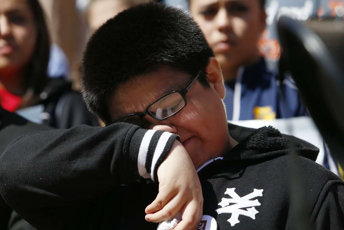 Sergio Govea, 9, wipes tears after reading a statement detailing his anxiety of the possibility that could be losing his parents during the United We Dream rally on the east side of the Texas Capitol to show they do not support Texas Senate Bill 4(SB4) in Austin, Wednesday, March 15, 2017. SB 4 would require all certain state, local, and campus police departments to comply with U.S. Customs and Immigration Enforcement (ICE) detainers. (Stephen Spillman / for Express-News)