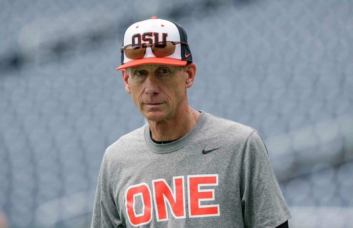 Oregon State coach Pat Casey follows team practice in Omaha, Neb., Friday, June 16, 2017. Oregon State is on the cusp of joining the company of the greatest college baseball teams of all time. At 54-4, the Beavers enter the College World Series with the fewest losses of any team since 1982. (AP Photo/Nati Harnik)