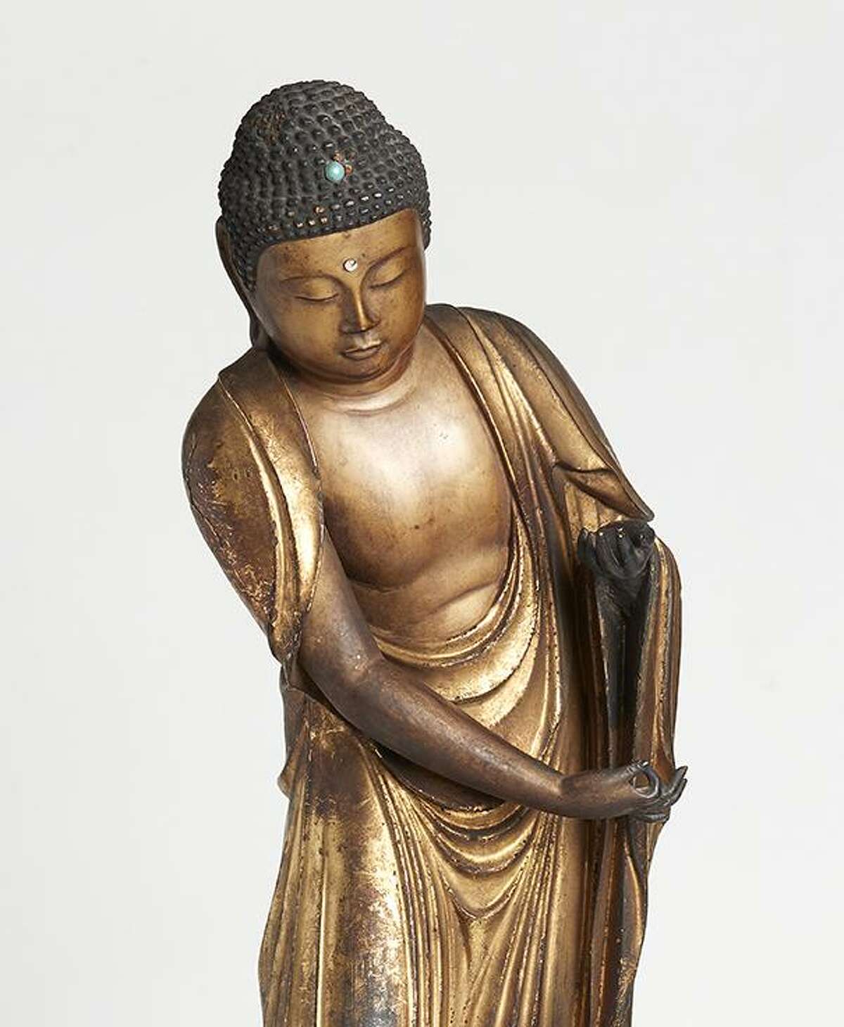 "Bowing Buddha," a gilt wood sculpture from the 17-18th century, is one of the works from Japan in "Heaven and Hell: Salvation and Retribution in Pure Land Buddhism." The exhibit at the San Antonio Museum of Art also features artworks from other countries, including Afghanistan, China and Korea.