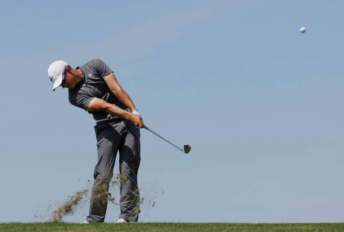 Cameron Champ hits on the eighth hole during the second round of the U.S. Open golf tournament Friday, June 16, 2017, at Erin Hills in Erin, Wis. (AP Photo/David J. Phillip)