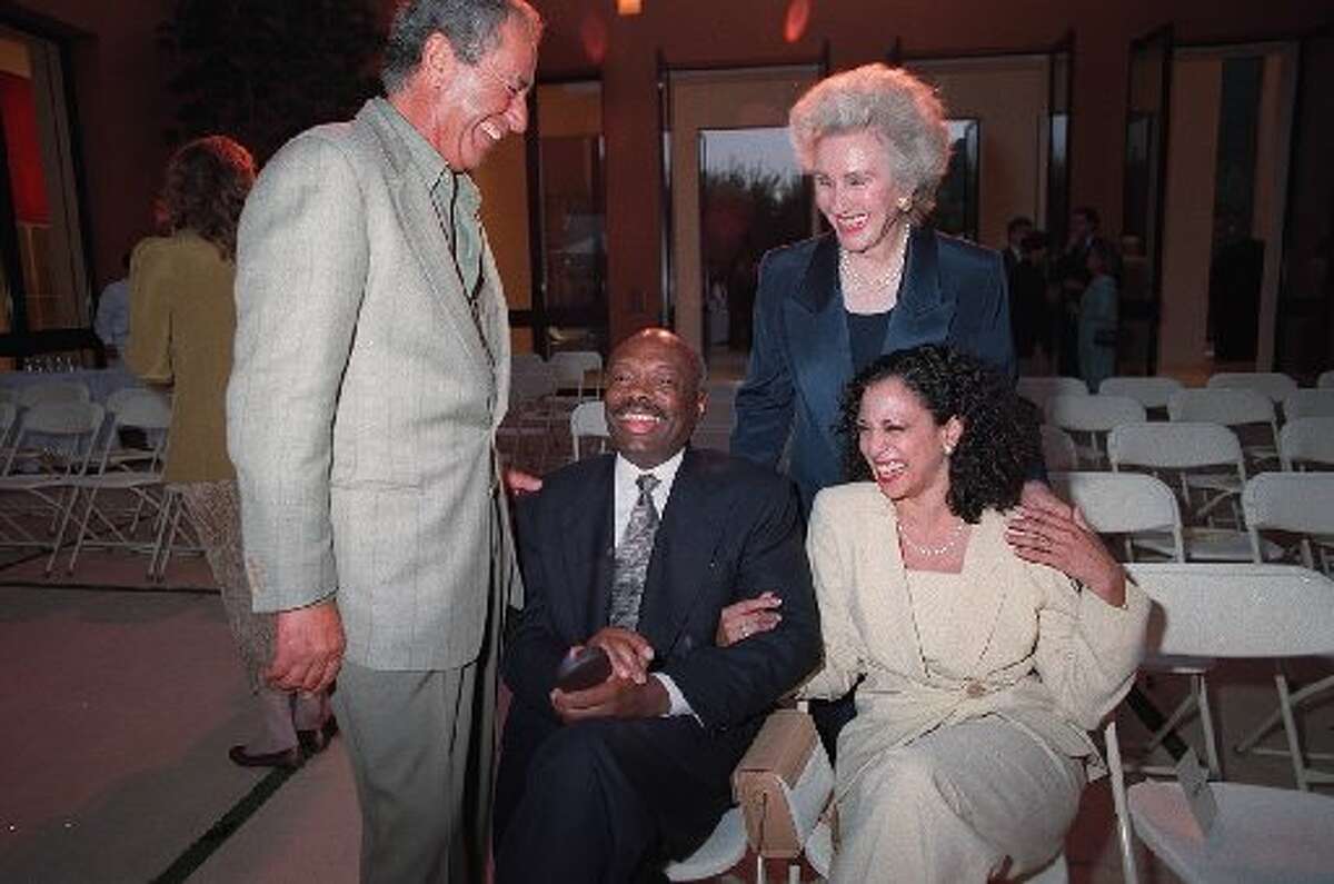 FILE – Then-Speaker of the California State Assembly Willie Brown and Kamala Harris (both seated) share a laugh with Claus Rouas (left) and Elaine McKeon (right) prior to the Wilkes Bashford Fashion Show. The event was held at the home of Frances and John Bowes to raise money for a museum. Barr and Owens were referring to a long-known fact that Harris and Brown dated in the 1990s. Click through to learn more about Kamala Harris. >>>