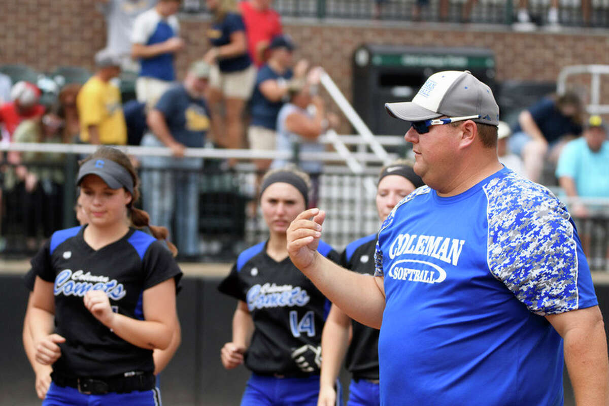 STEVEN SIMPKINS|for the Daily News Coleman softball coach Chad Klopf gathers his team together for a talk prior to Friday's Division 4 semifinal vs. Ottawa Lake Whiteford on Friday in East Lansing.