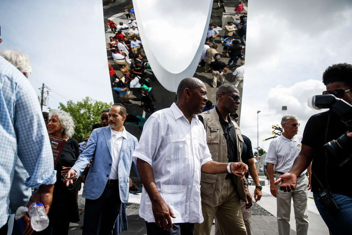 Houston mayor Sylvester Turner walks through the open-topped archway at Emancipation Park before a rededication ceremony for the park Saturday, June 17, 2017 in Houston after it underwent a $33 million renovation.