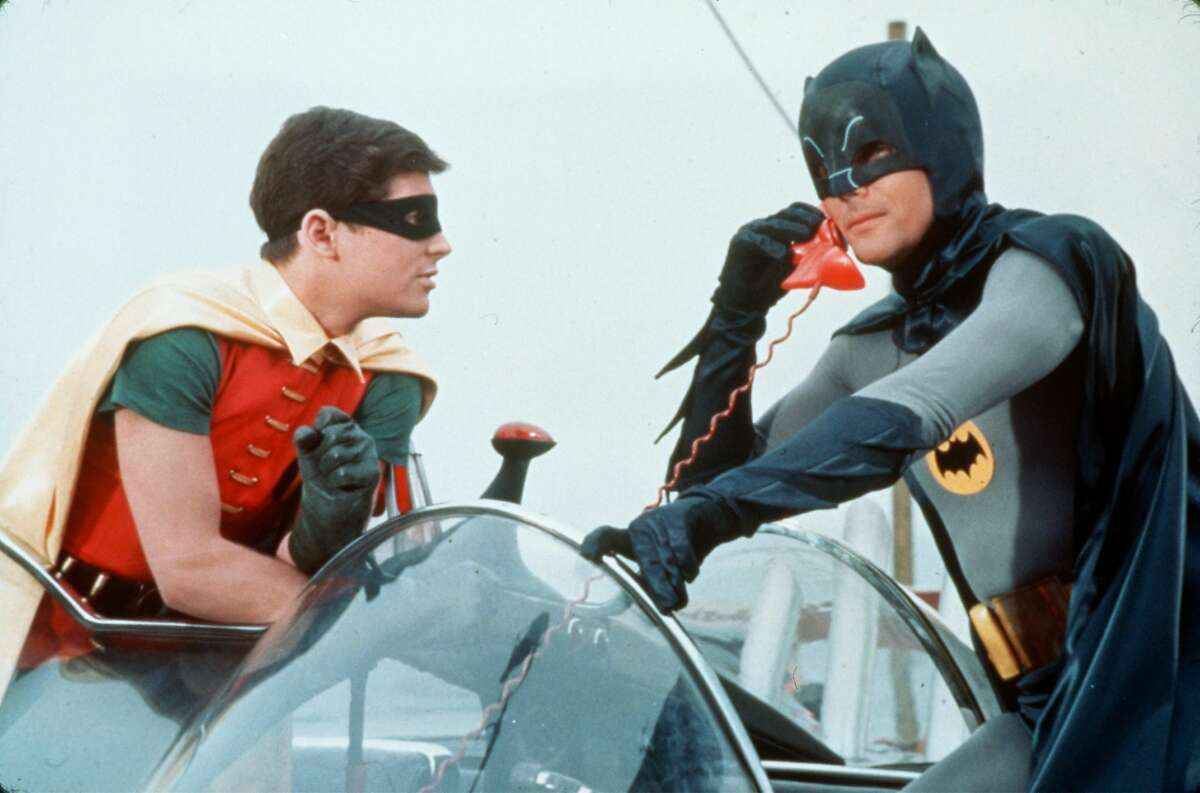 ``BATMAN: THE MOVIE'' (35th Anniversary) - ( l-r) Burt Ward as Robin/Dick Grayson and Adam West as Batman/Bruce Wayne. HOUCHRON CAPTION (08/20/2001): Batman and Robin plan strategy in the 1966 film ``Batman: The Movie.'' HOUCHRON CAPTION (11/17/2004) SECSTAR COLORFRONT: Jerry Seinfeld (NOT PICTURED), Batman and Yoda (NOT PICTURED) have something in common: They once were masters of their domains.
