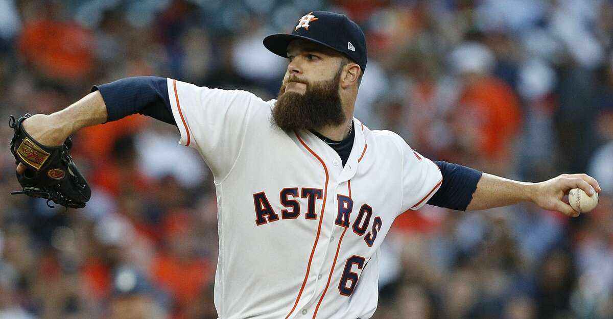 HOUSTON, TX - APRIL 03: Dallas Keuchel #60 of the Houston Astros pitches in the first inning against the Seattle Mariners on Opening Day at Minute Maid Park on April 3, 2017 in Houston, Texas. (Photo by Bob Levey/Getty Images)