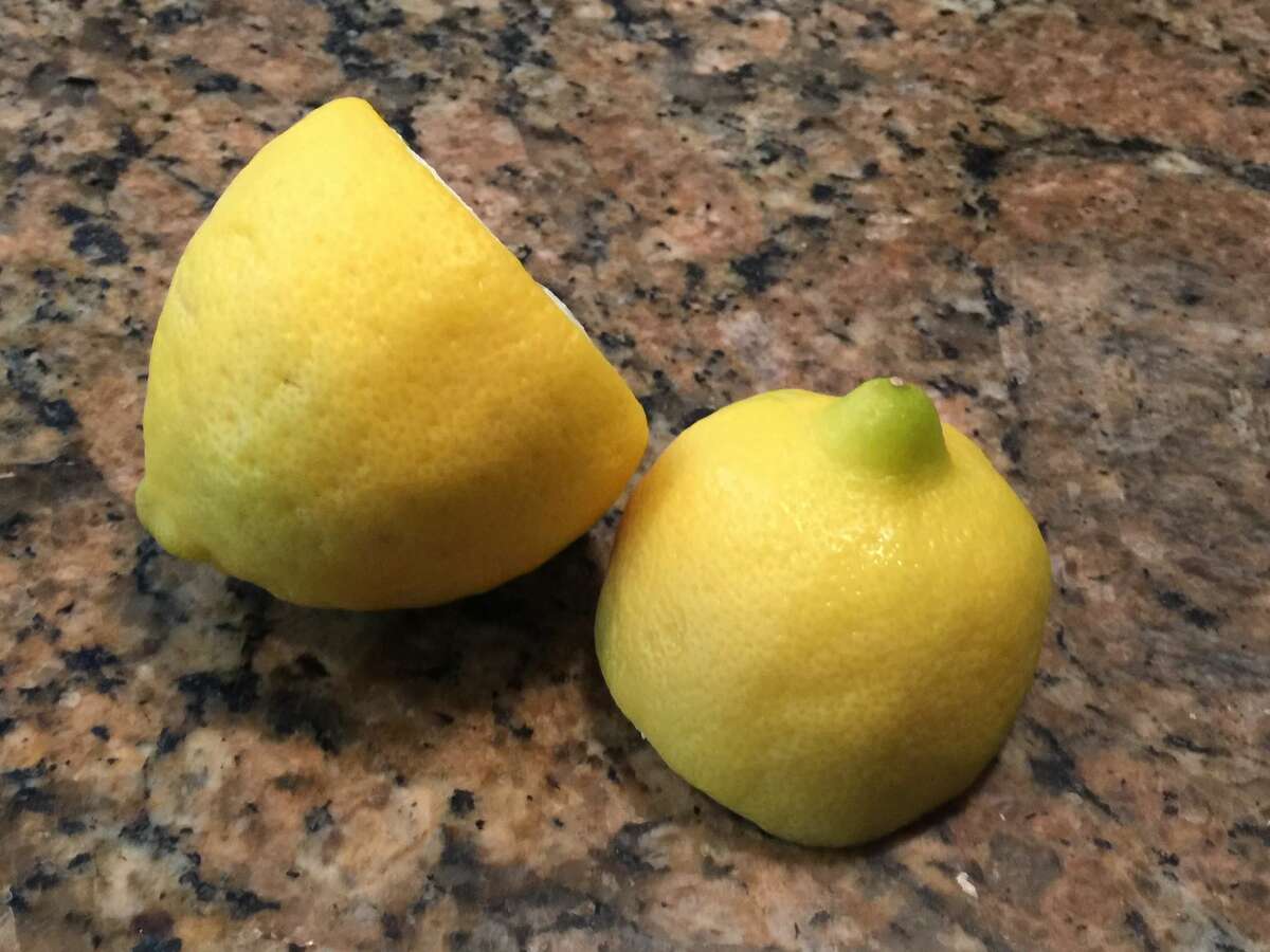 2. I love lemons! I have eaten so many over the years that my two front teeth are bonded because of lost enamel.