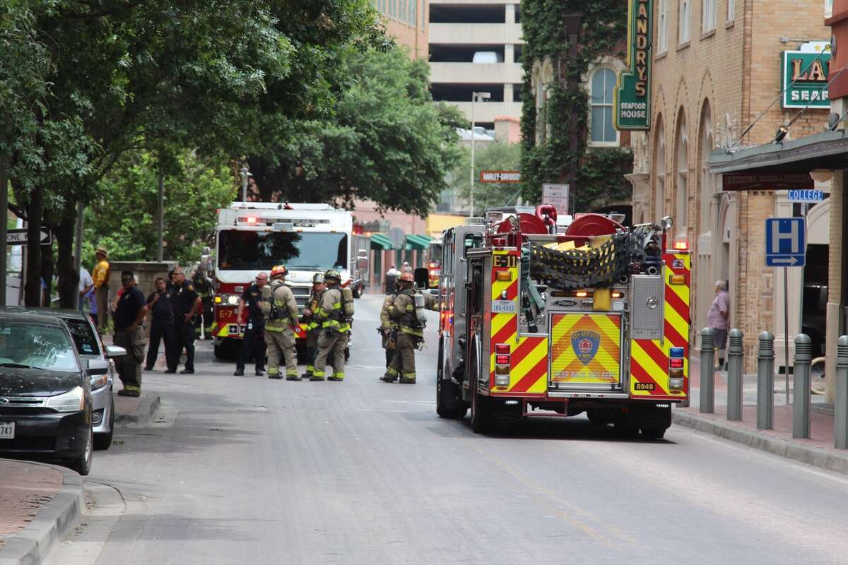 Smoke billowing from a building in the 400 block of Houston Street in downtown San Antonio resulted in a large emergency response on Monday, June 19, 2017.