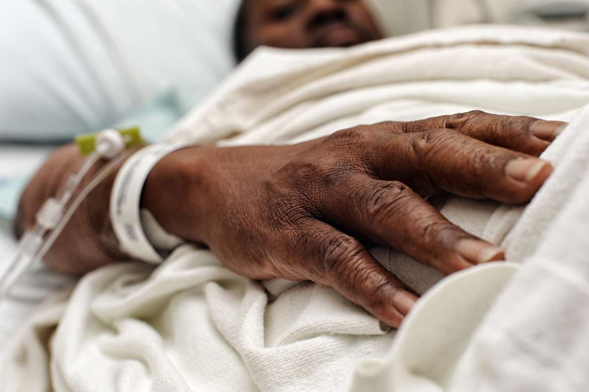 Hospital patient African American male in a hospital bed. Details Credit: Gerville