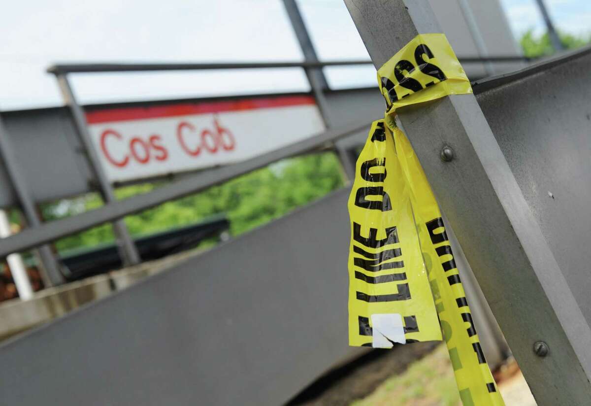 Police tape remains at the Cos Cob Metro-North station on Monday. , June 19, 2017. A 17-year-old Greenwich High School student was struck and killed by a Metro-North train just after midnight Sunday, June 18, 2017 near the Cos Cob train station.