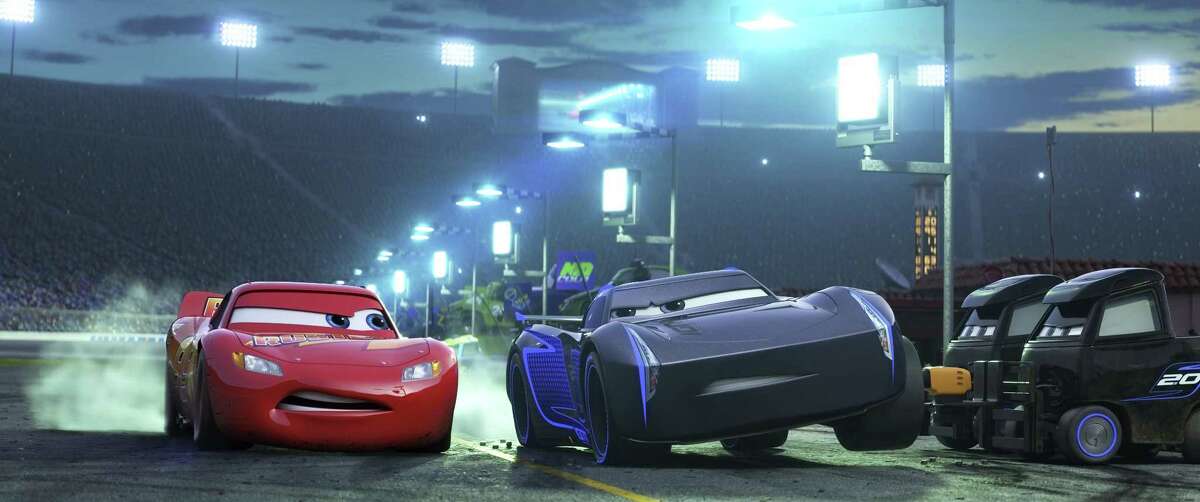 Lightning McQueen, voiced by Owen Wilson, left, and Jackson Storm, voiced by Armie Hammer, in a scene from “Cars 3,” a story of Lightning’s coping with inevitable decline and the realization that there are other, faster cars entering the sport.