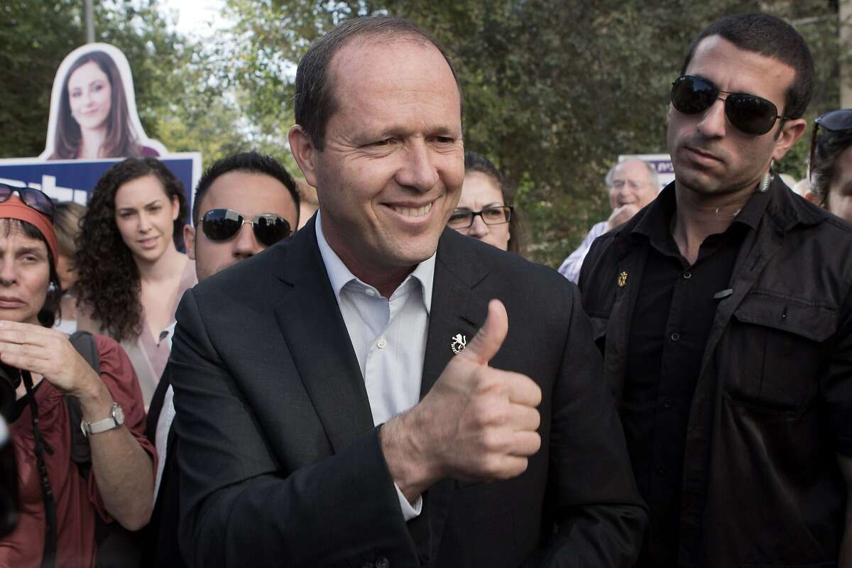 Jerusalem Mayor and candidate for the municipal elections, Nir Barkat gestures as he walks in a street campaigning on October 22, 2013 in Jerusalem during Israels municipal elections. Israelis are voting in municipal elections in a poll likely to be shunned by much of the public who see local authorities as tainted by corruption. AFP PHOTO/MENAHEM KAHANAMENAHEM KAHANA/AFP/Getty Images