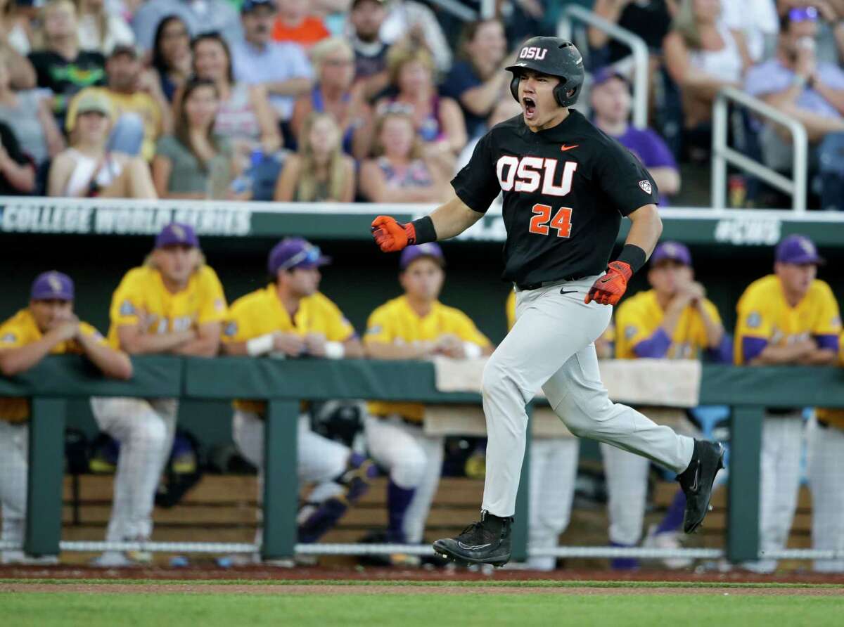 Oregon State's KJ Harrison is fired up rounding the bases after hitting a grand slam in the sixth.
