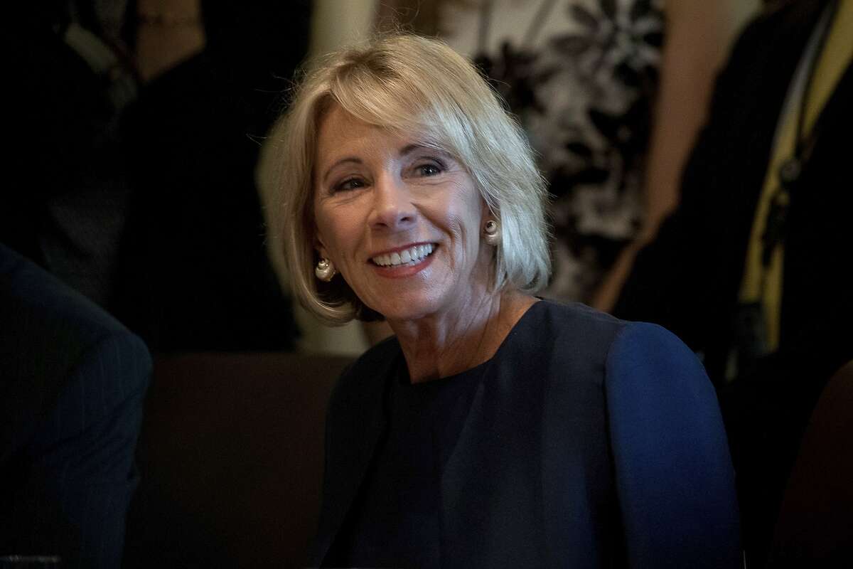 Education Secretary Betsy DeVos attends a Cabinet meeting with President Donald Trump, Monday, June 12, 2017, in the Cabinet Room of the White House in Washington. (AP Photo/Andrew Harnik)