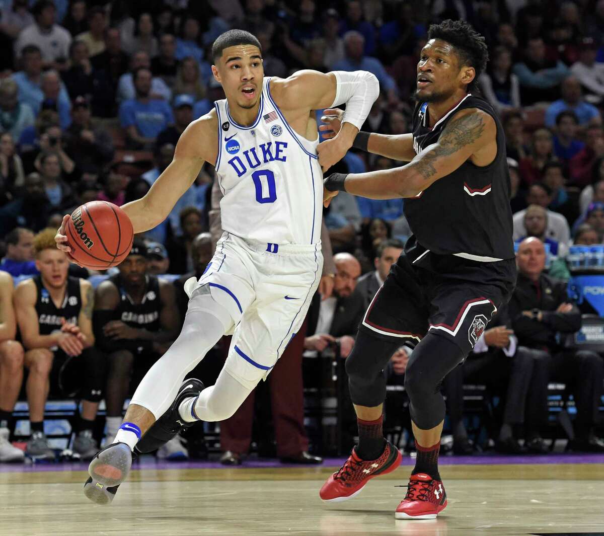 In this March 19, 2017, file photo, Duke's Jayson Tatum, left, drives past South Carolina's Chris Silva during the first half in a second-round game of the NCAA men's college basketball tournament, in Greenville, S.C. The top forwards in ThursdayÂ?’s NBA draft needed only a season in college to secure their position in the lottery. KansasÂ?’ Josh Jackson and DukeÂ?’s Jayson Tatum are one-and-done small forwards with size and athleticism, while Florida StateÂ?’s Jonathan Isaac and ArizonaÂ?’s Lauri Markkanen headline the crop of power forwards or stretch-4s with the potential to play inside or out.