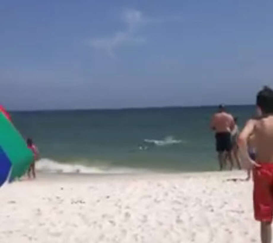 Beachgoer catches video of shark near beach in Gulf Shores