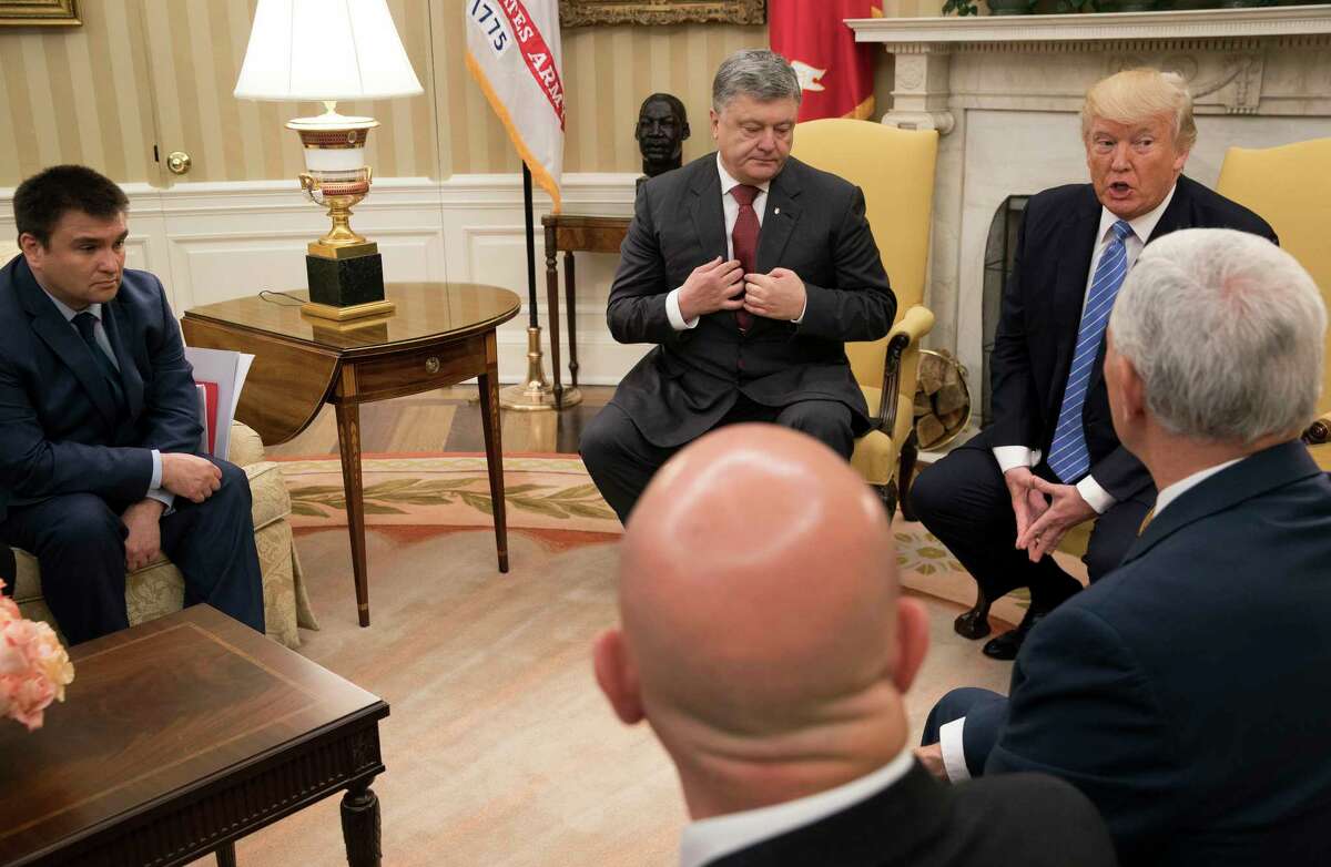 President Donald Trump meets with Ukrainian President Petro Poroshenko in the Oval Office at the White House, in Washington on Tuesday.
