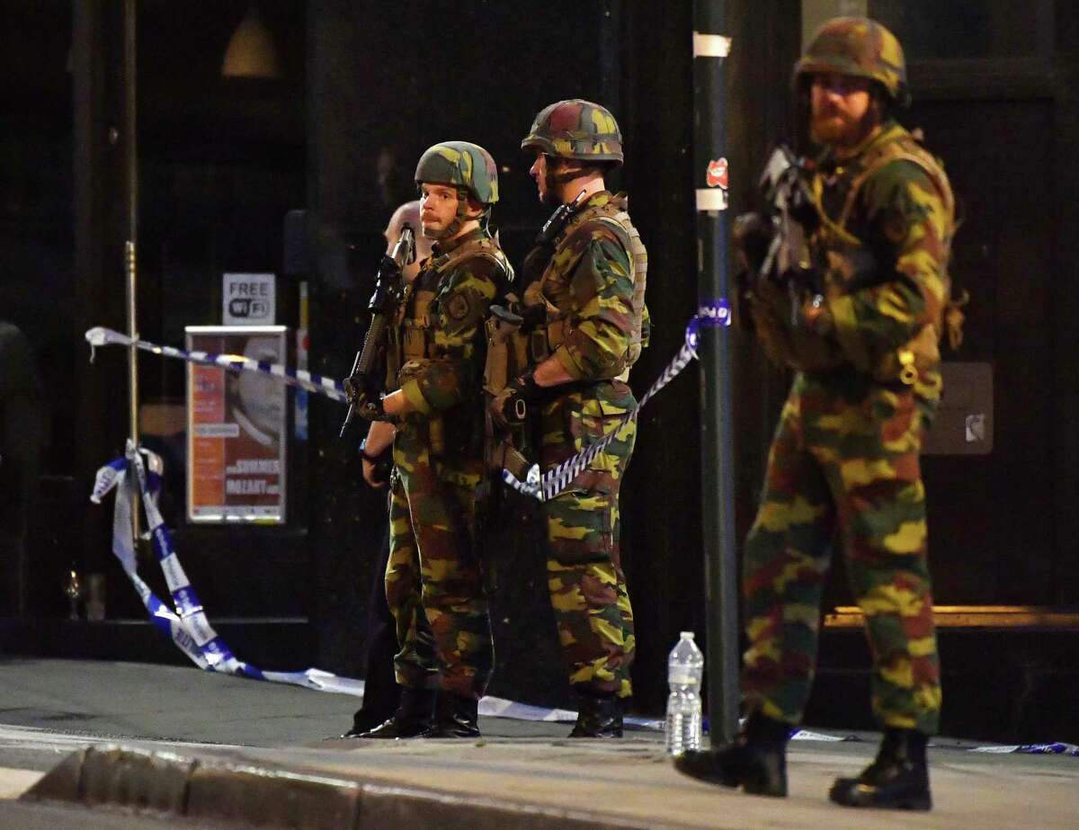 Belgian Army soldiers patrol in front of Central Station in Brussels after a reported explosion on Tuesday, June 20, 2017. Belgian media are reporting that explosion-like noises have been heard at a Brussels train station, prompting the evacuation of a main square. (AP Photo/Geert Vanden Wijngaert)