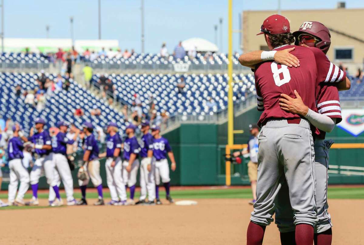 While the TCU players, left, congratulate each other on living to play another day, Texas A&M's Braden Shewmake (8) and Blake Kopetsky commiserate on the Aggies' season ending Tuesday at 41-23.