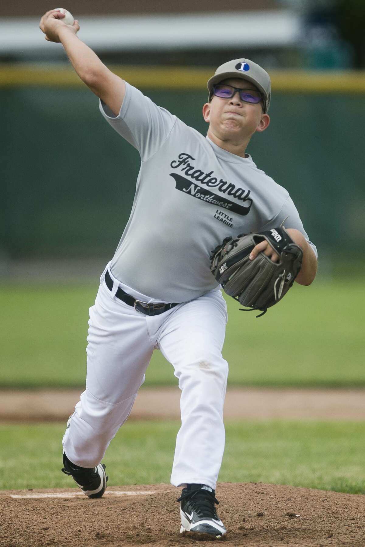Jay Worsley pitches the ball during his team's 12-2 victory over Sowle Properties during the major Little League city championship game on Tuesday, June 20, 2017 in Midland.
