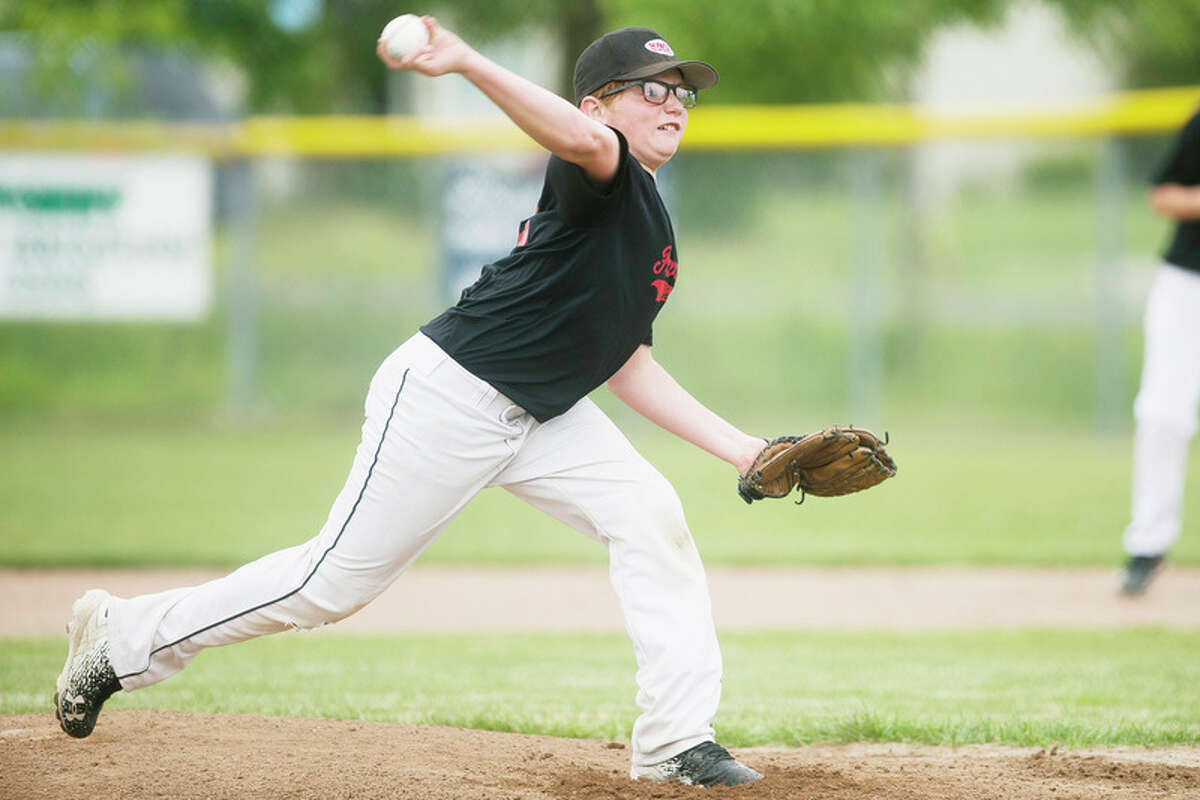 KATY KILDEE | kkildee@mdn.net Adam Brenske pitches the ball during his team's 12-2 loss to Ieuter Insurance during the major Little League city championship game on Tuesday in Midland.
