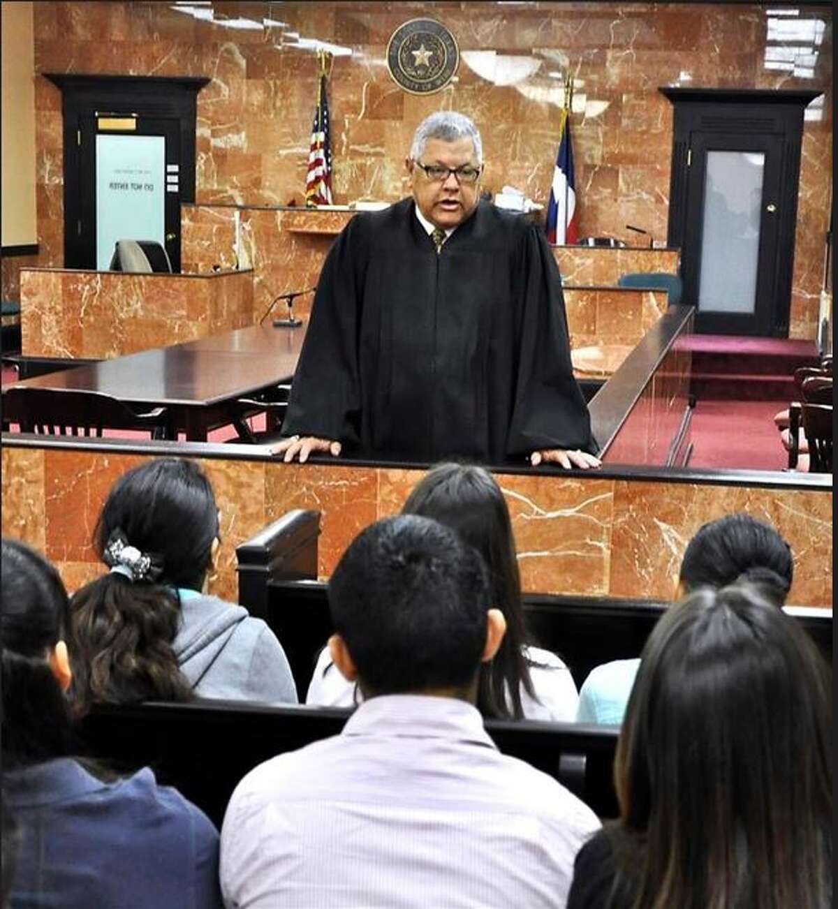 Alvin "Ben" Morales, judge for the County Court at Law #1, talks to a group of students from Martin High School. Morales died Monday, June 19,