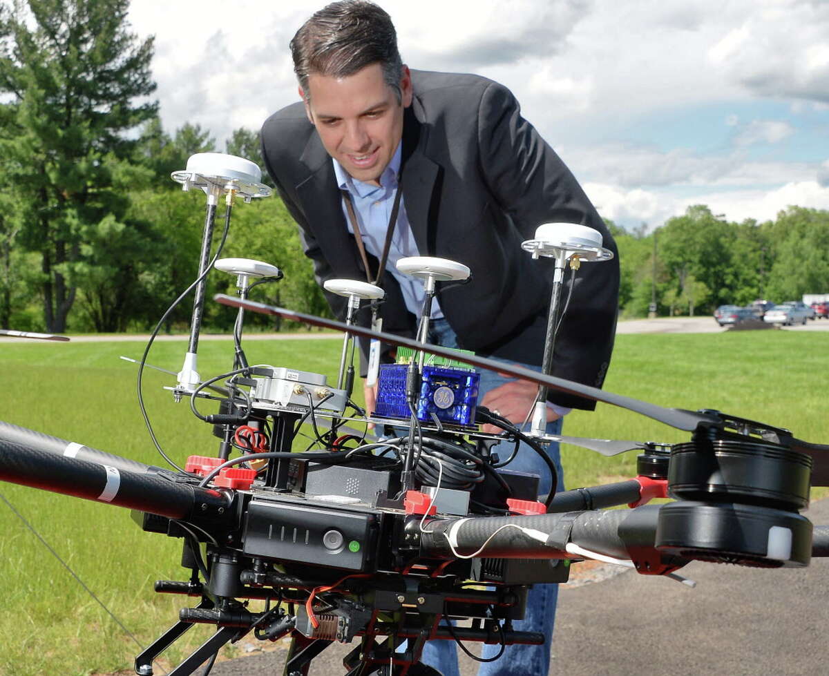 Director of robotics at GE Global Research looks over his team's Euclid aerial inspection system autonomous drone Tuesday June 20, 2017 in Niskayuna, NY. (John Carl D'Annibale / Times Union)