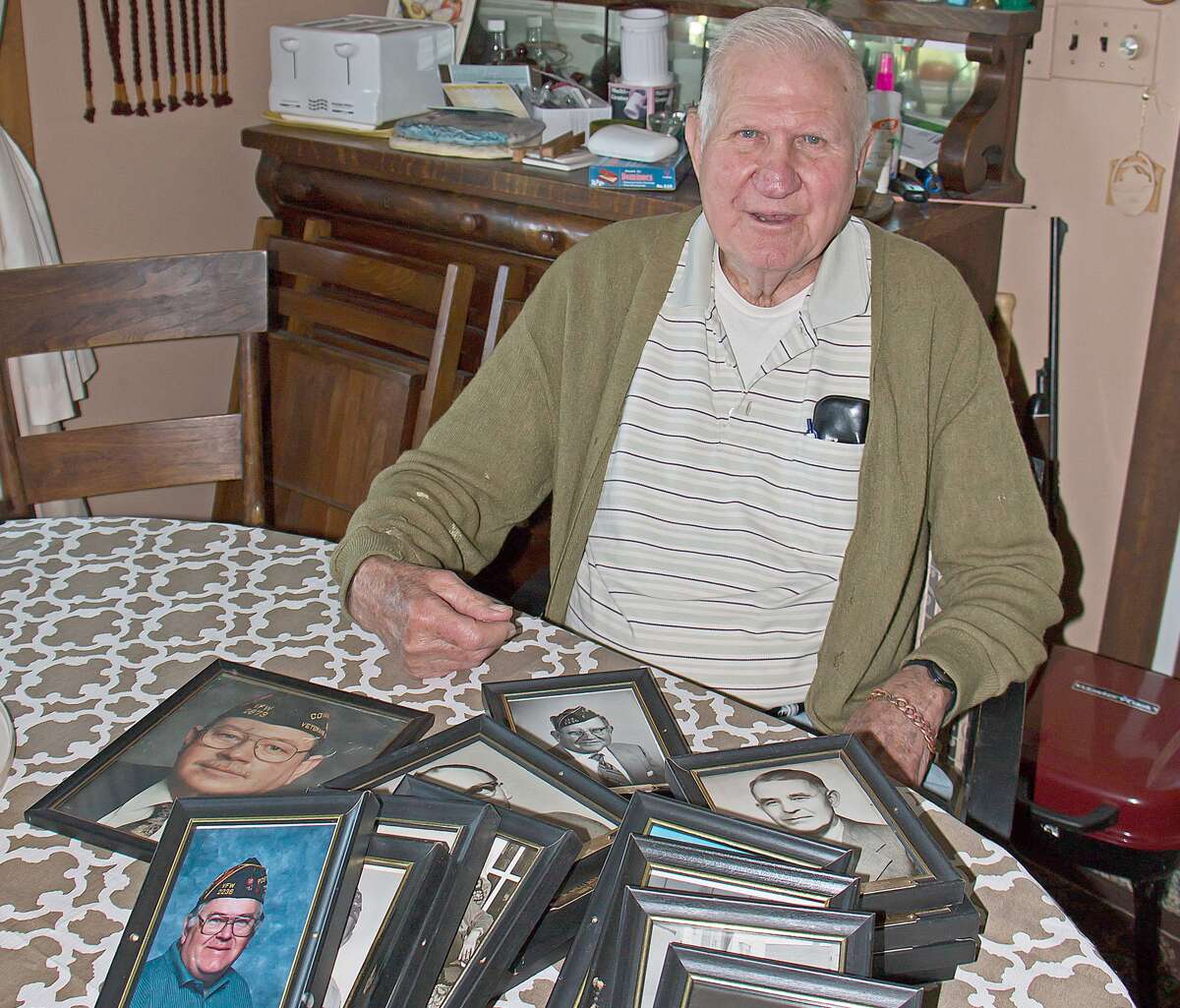 Joe Burzinski, a member of the Pigeon VFW, is on a mission to find relatives or friends of past post commanders that may be interested in having photos of their loved ones.