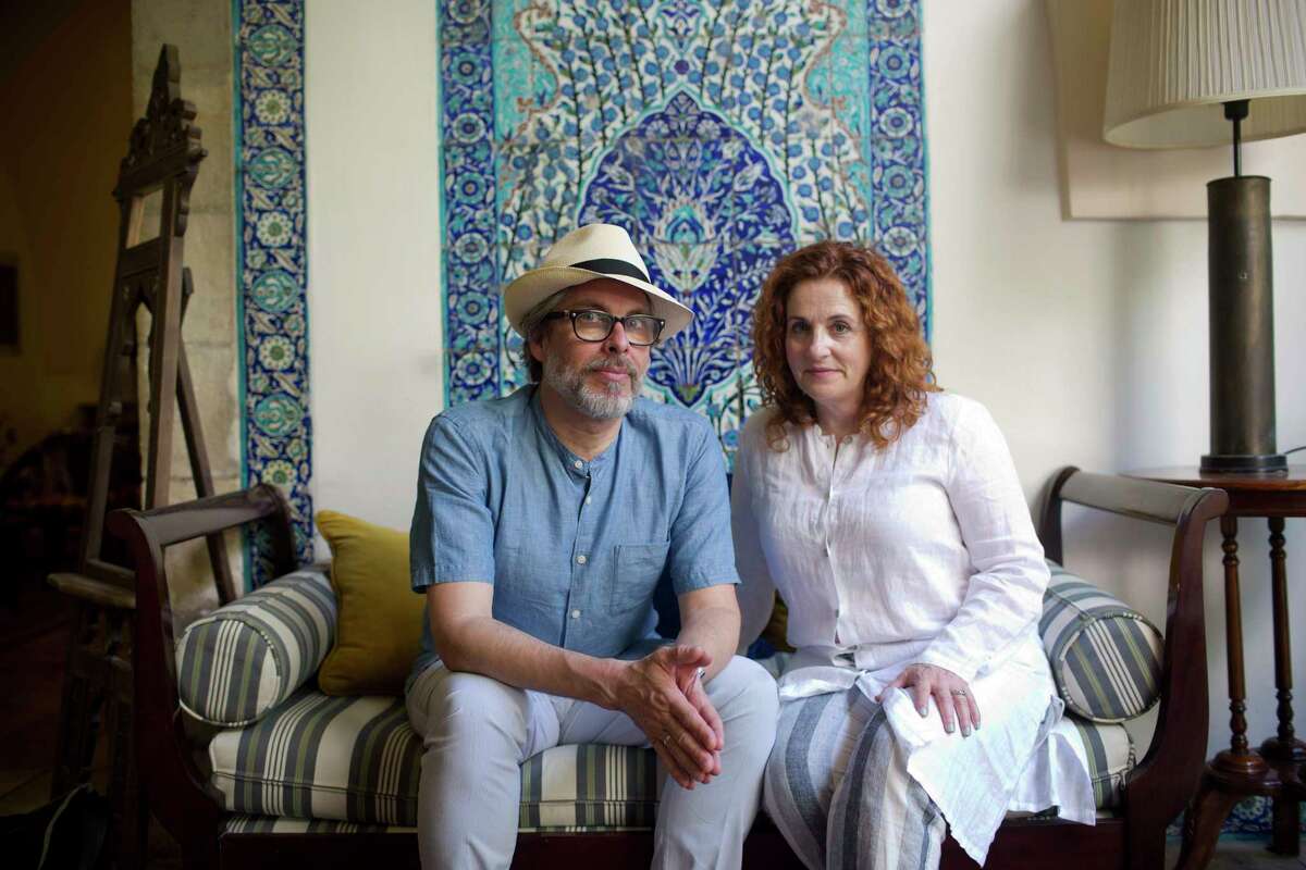 In this June 18, 2017 photo, authors Michael Chabon, left, and Ayelet Waldman pose for a photo at the launch of a new book of essays titled "Kingdom of Olive and Ash" that describes the Israeli occupation of the West Bank, now in its 50th year, in Jerusalem. A group of renowned authors has published a collection of essays about IsraelÂ?’s occupation of the West Bank, hoping their grim firsthand perspectives will draw attention to what they describe as 50 years of oppressive and dehumanizing conditions (AP Photo/Oded Balilty)