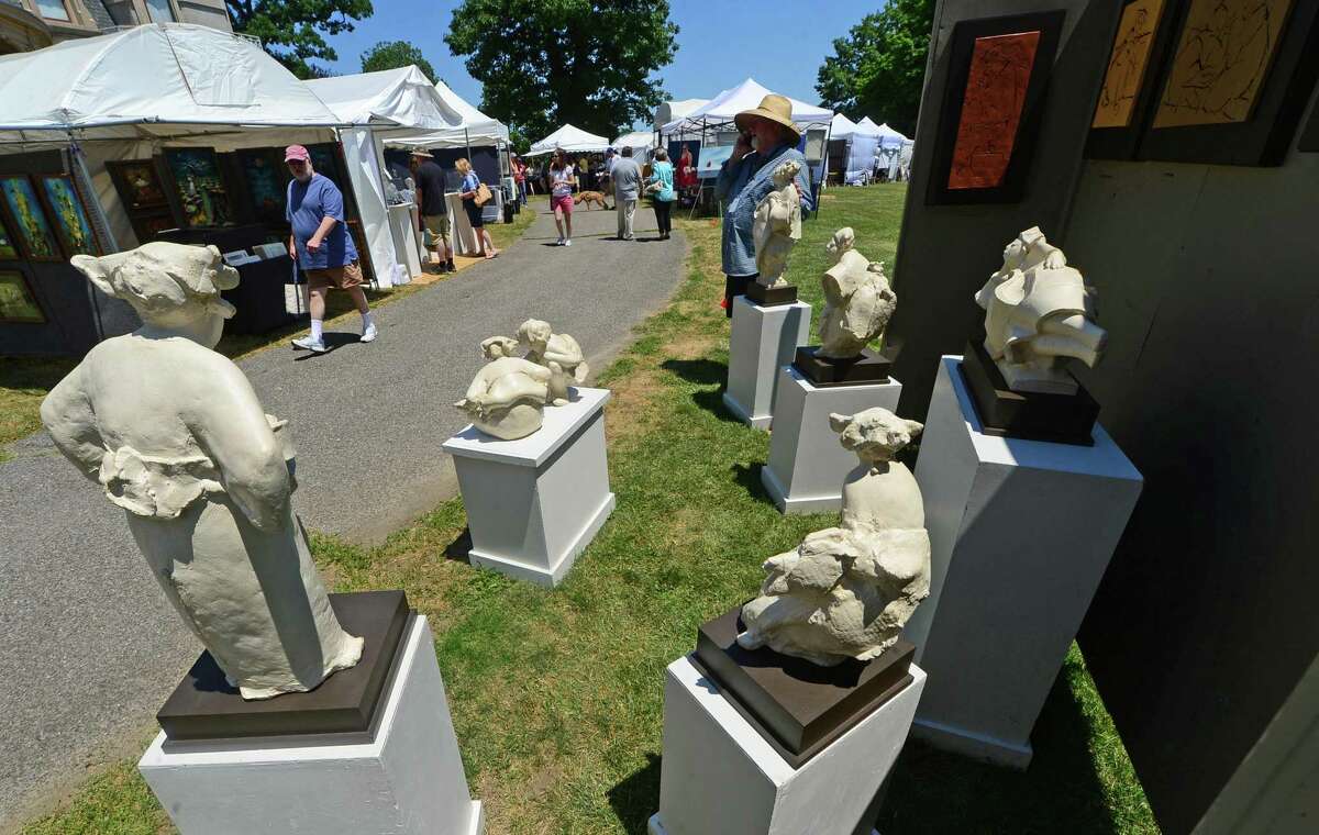 David Bryce displays his ceramic sculptures at the 4th Annual Norwalk Art Festival in June 2016 at Mathews Park in Norwalk.