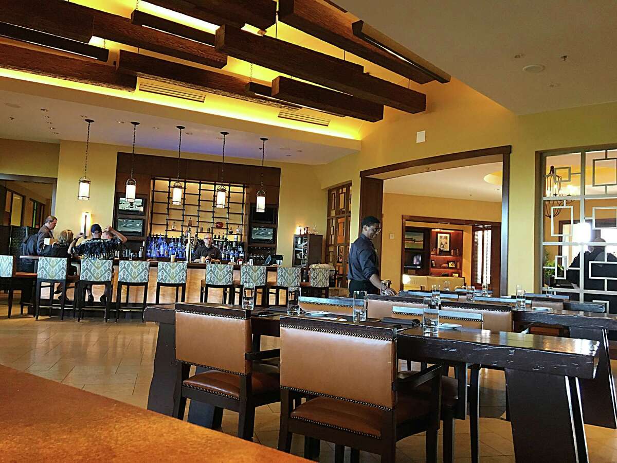 The lounge and bar of 18 Oaks, the steakhouse at the JW Marriott San Antonio Hill Country Resort & Spa.