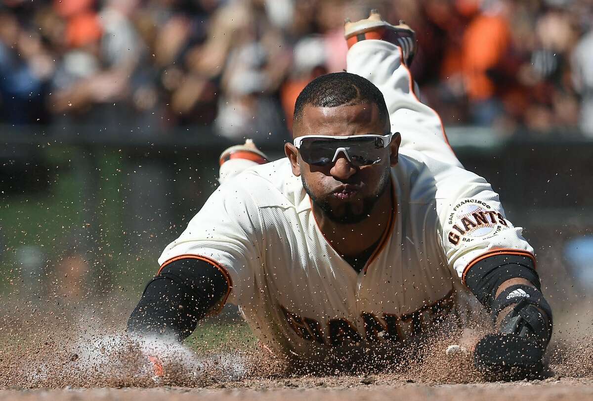 SAN FRANCISCO, CA - JUNE 11: Eduardo Nunez #10 of the San Francisco Giants scores against the Minnesota Twins in the bottom of the seventh inning at AT&T Park on June 11, 2017 in San Francisco, California. (Photo by Thearon W. Henderson/Getty Images)