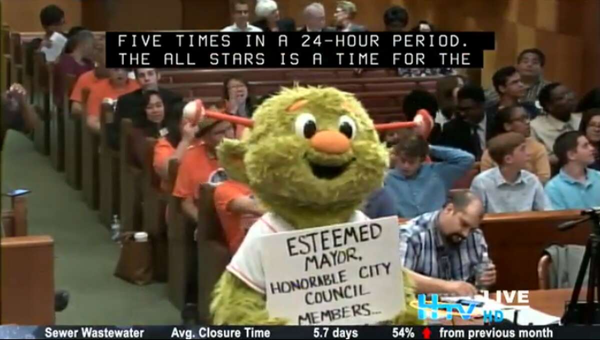 Houston Astros' Orbit recently appeared at city hall to toss t-shirts and urge Houstonians to vote for Astros players for the upcoming MLB All-Star game.