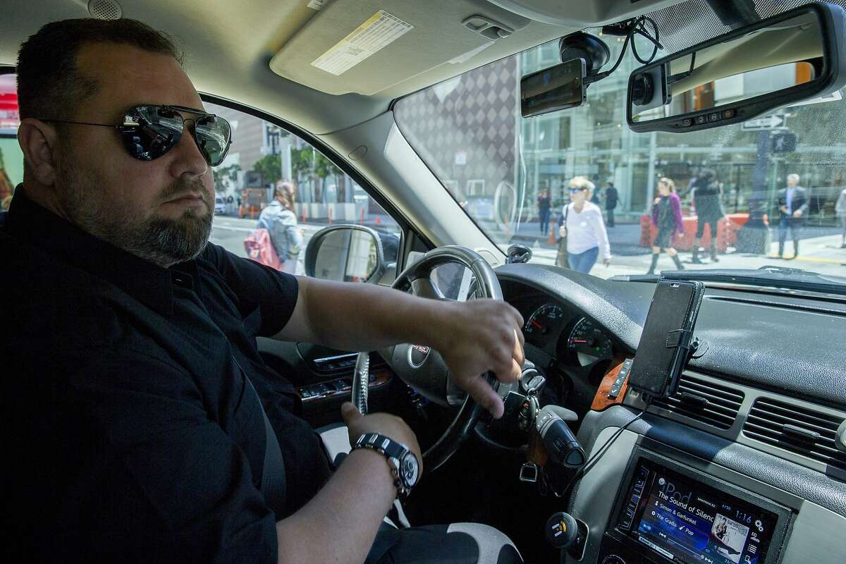 Hemerson Reis drives with the Nexar app activated on his smartphone on Tuesday, June 20, 2017, in San Francisco, Calif. The app turns a smartphone into a dash cam.